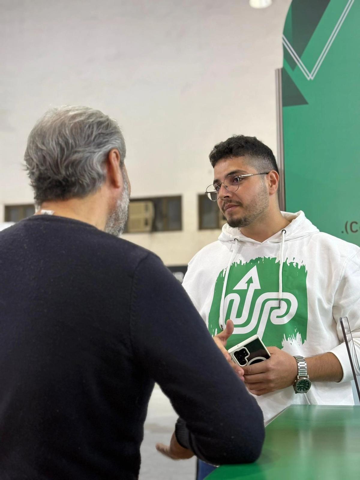 Partnership conversation at UPay booth